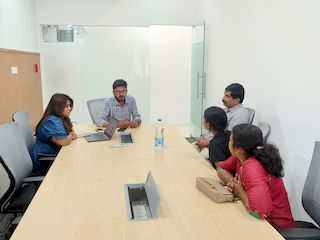 upGrad Madurai office - student and parents with the counselling team after their study abroad session